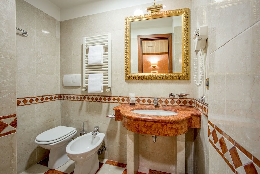 Фото Tridente Suites