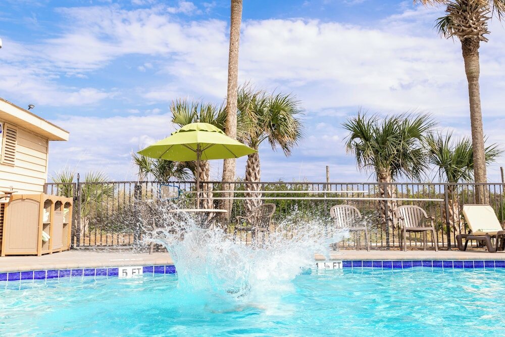 Фото Surfside Beach Oceanfront Hotel