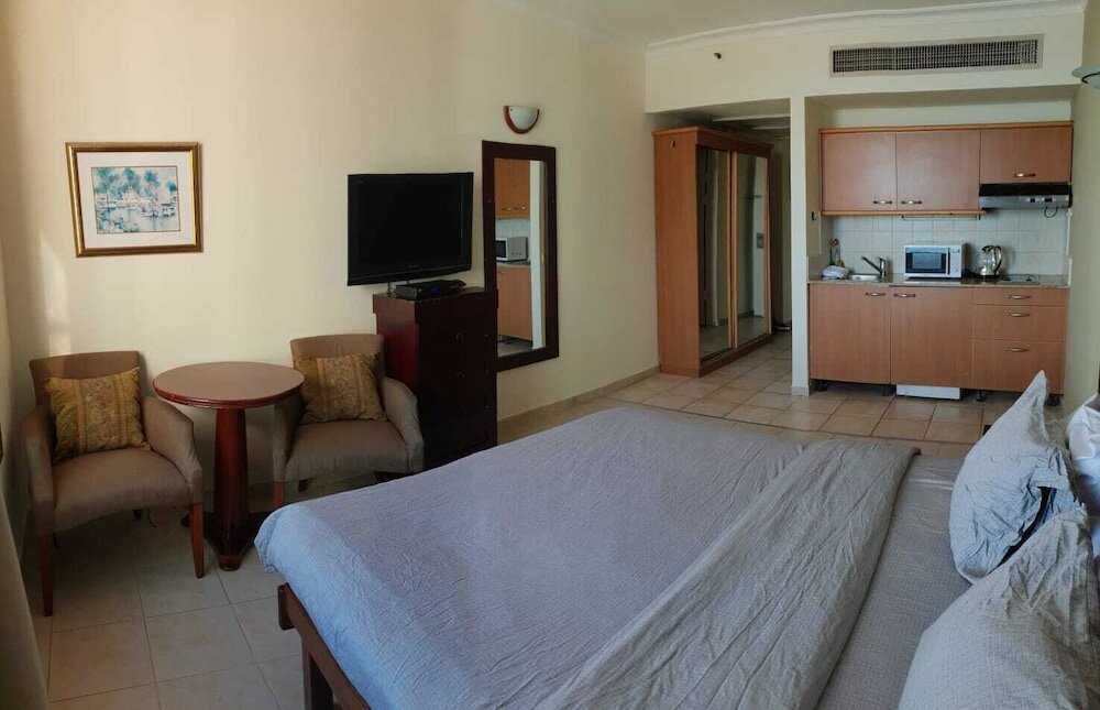 Фото Hof Hacarmel Apartments