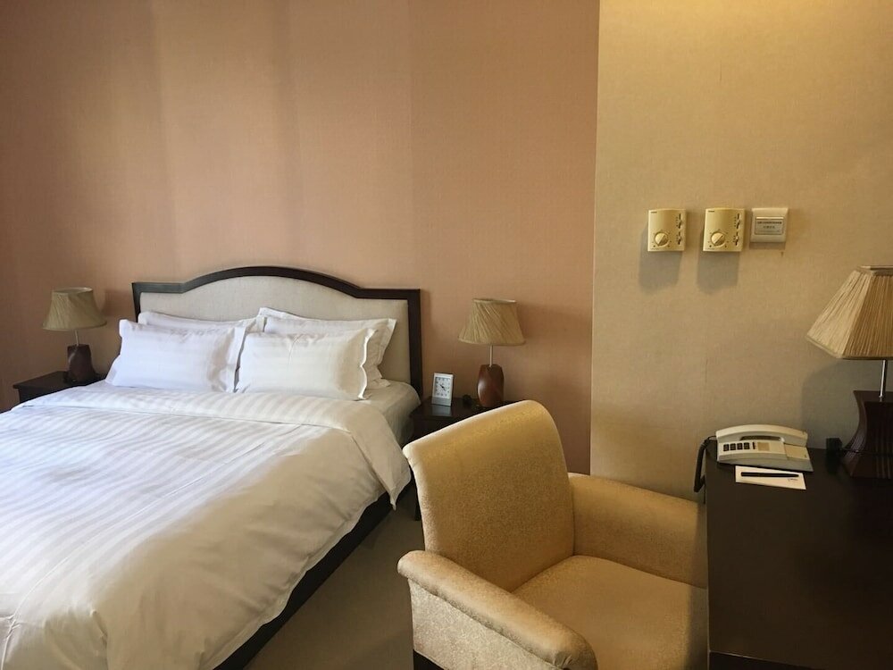 Фото Dalian Asia Pacific Service Apartment