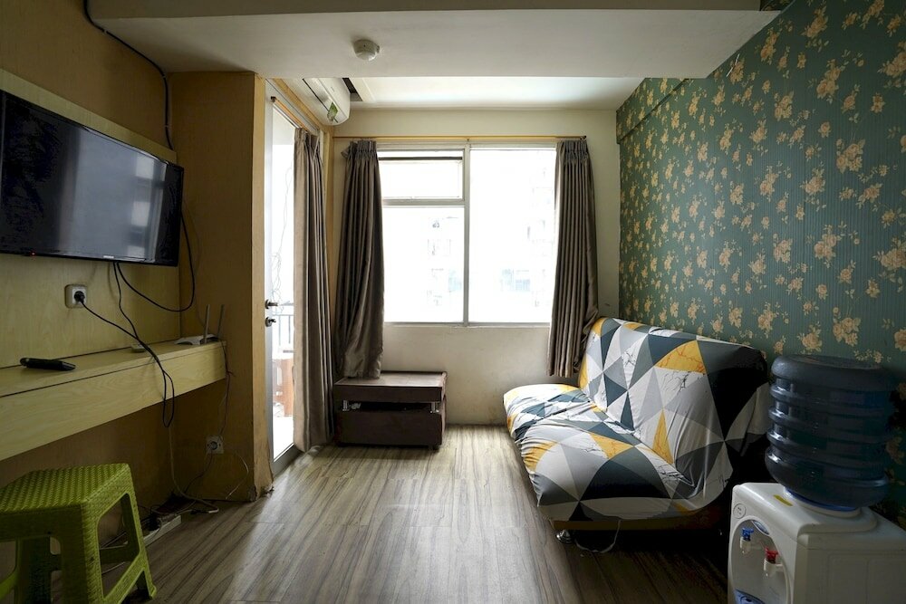 Фото Collection O 92981 Apartemen The Jarrdin