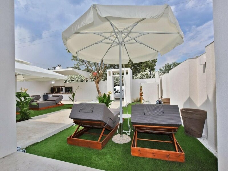 Гостиница 4 Elements Earth Sea Side Luxury Suites
