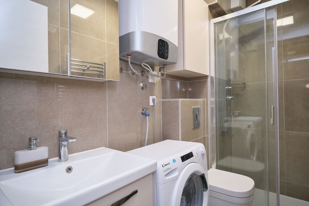 Фото Modern City Apartment