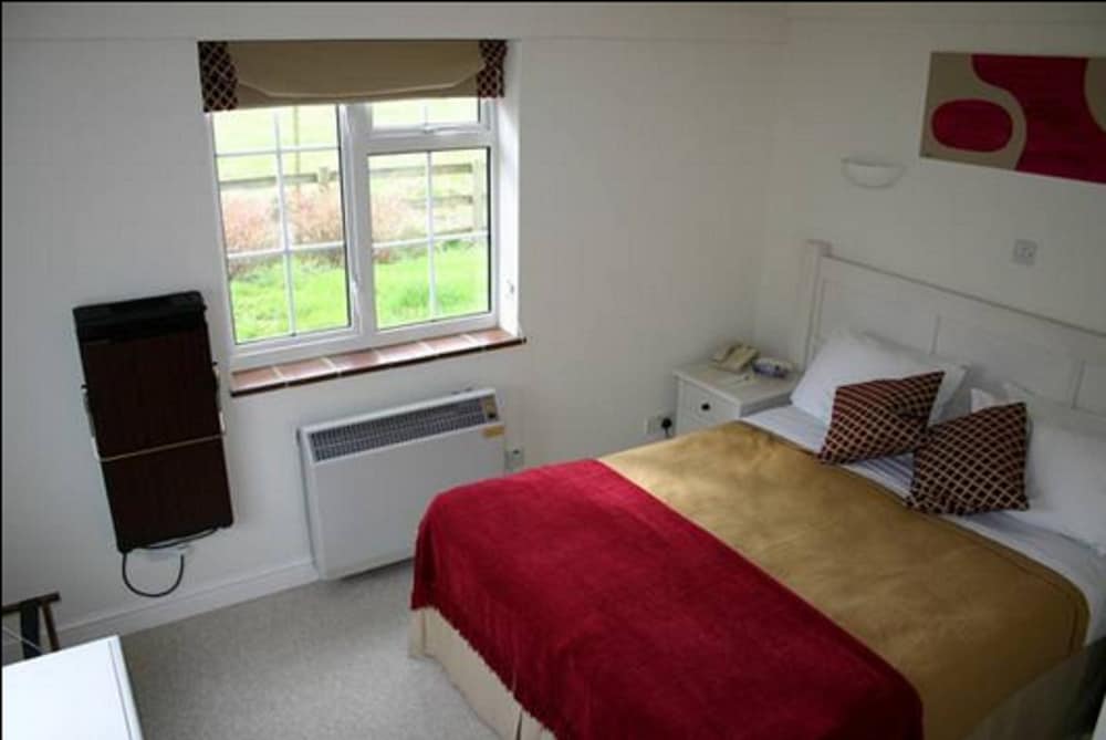 Фото The Peacock Country Inn