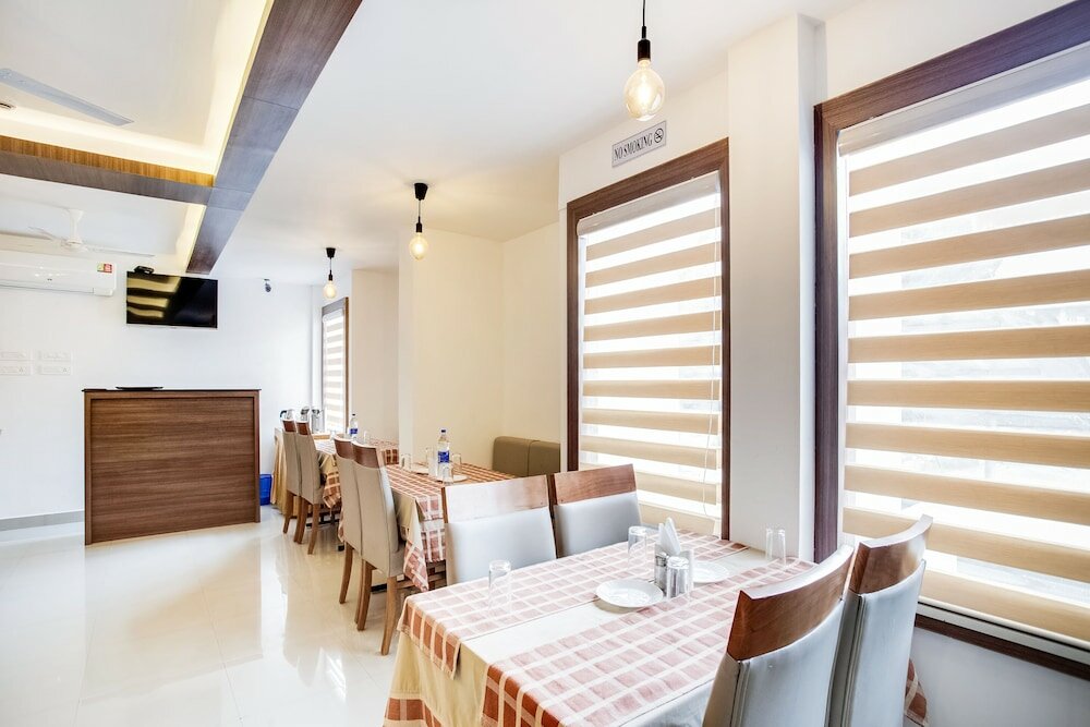 Фото Capital O 60558 Hotel Midhuna International