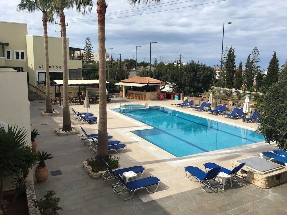 Фото Dionysos Apartments & Studios