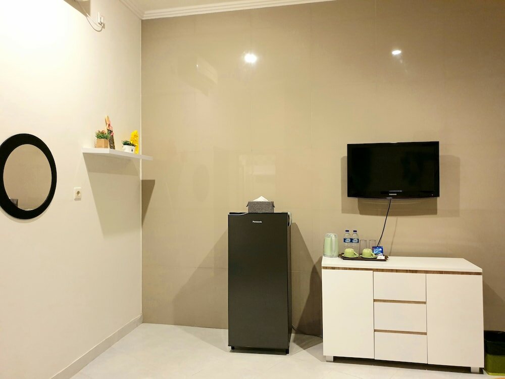 Фото Comfy Room in Piliau Residence