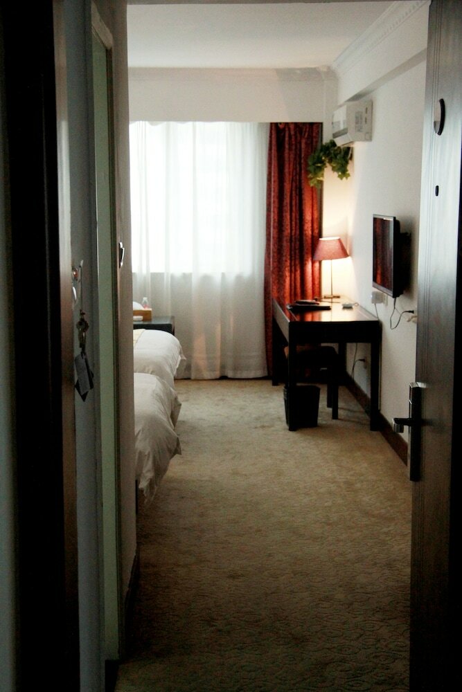 Фото Shanghai Coinfamily Hotel