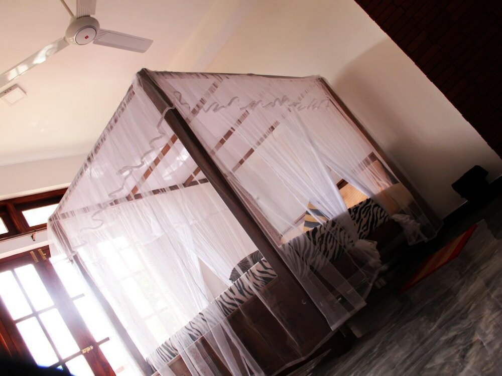 Фото Lizzie Villa Guest House