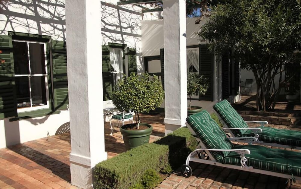 Фото Buiten Verwagten Guest House