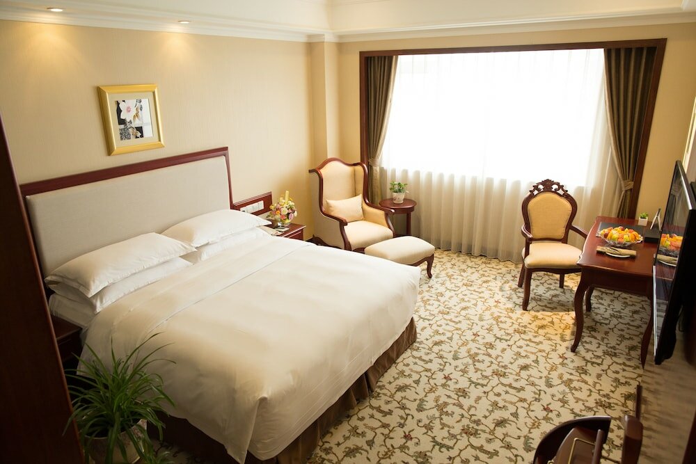 Фото Enrichee Gloria Plaza Hotel Qingdao