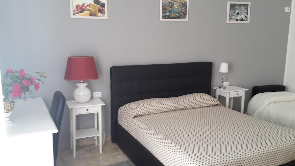 Фото Gualtiero camere e suite