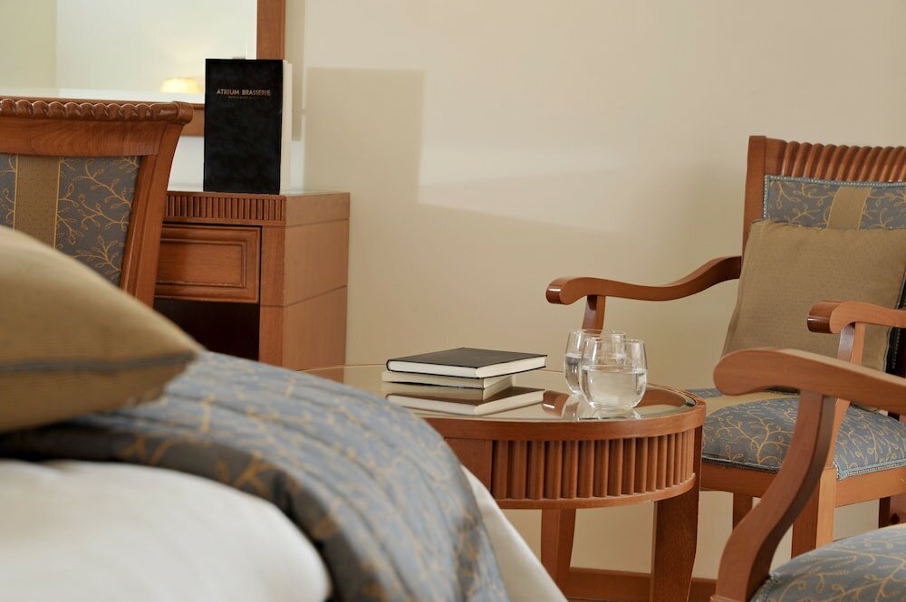 Фото Athens Atrium Hotel and Suites