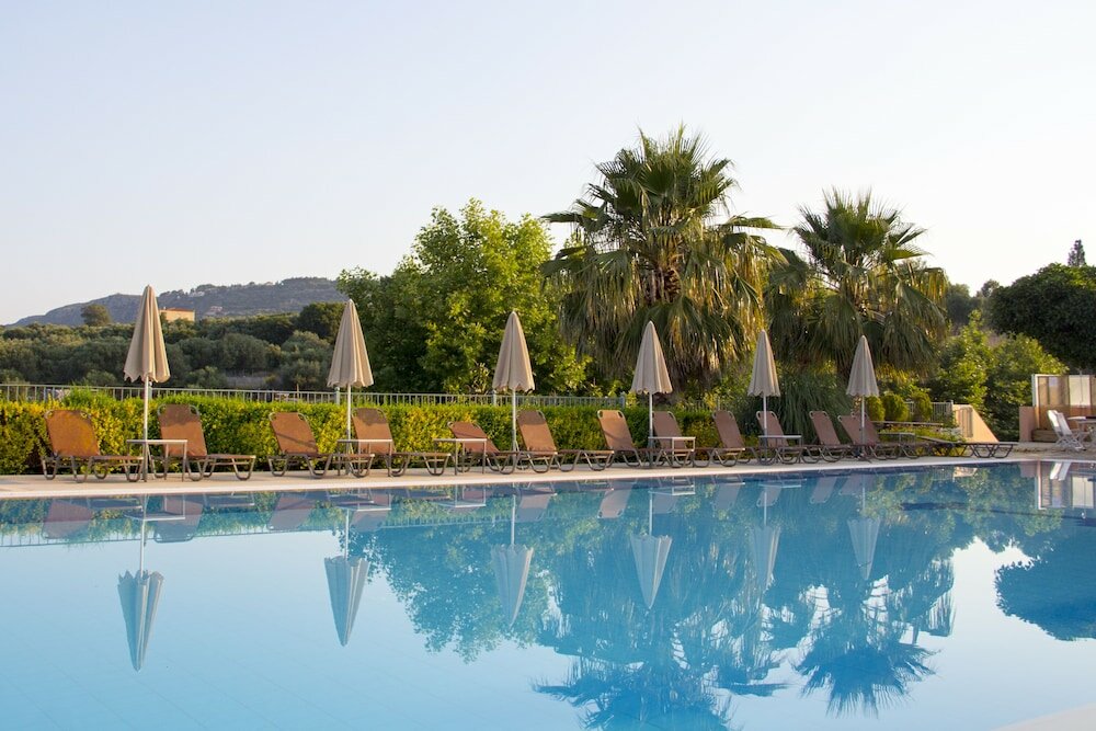 Фото Astra Village Hotel Suites