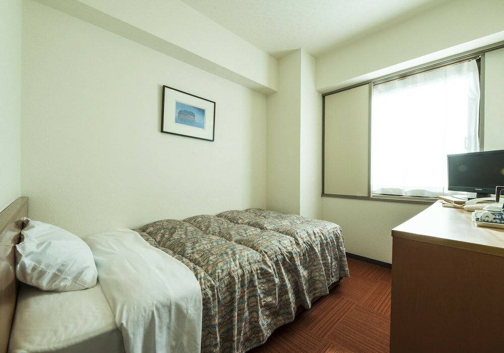 Фото Isahaya Station Hotel