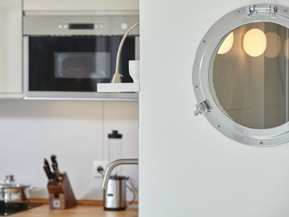 Фото Ferienhaus & Appartments Düneneck 8