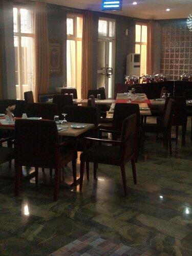 Гостиница Signatious Hotel and Suites Delta в Варри