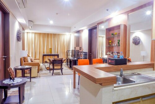 Гостиница Cozy Pool View Kemang Village Residence Apartment with Direct Access to Mall