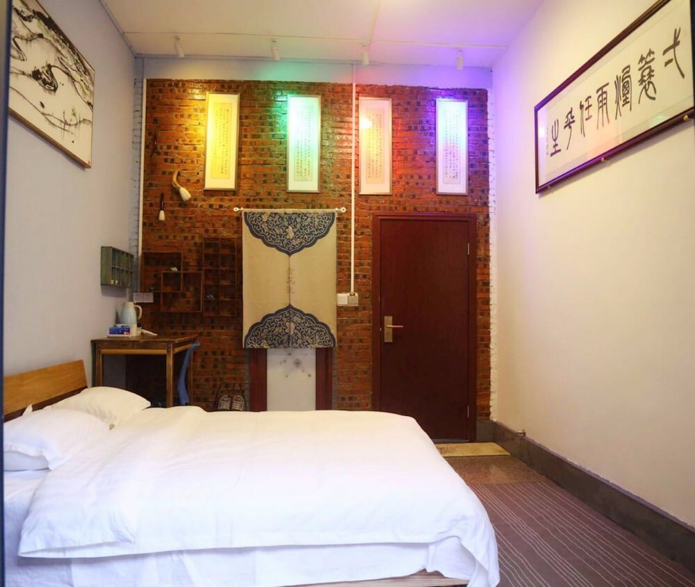 Фото Zhaohuaxishi Youth Hostel