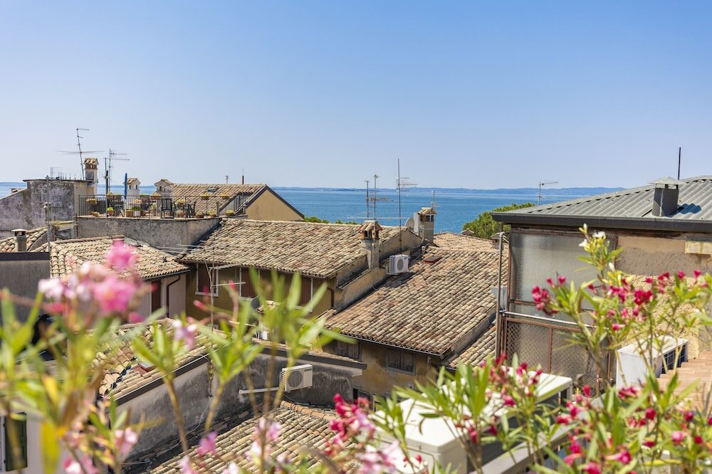 Фото Corte Realdi Boutique Rooms Garda