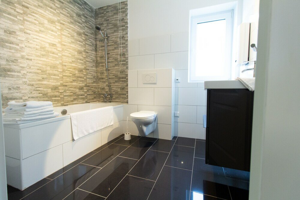 Фото T & T Suites Raunheim