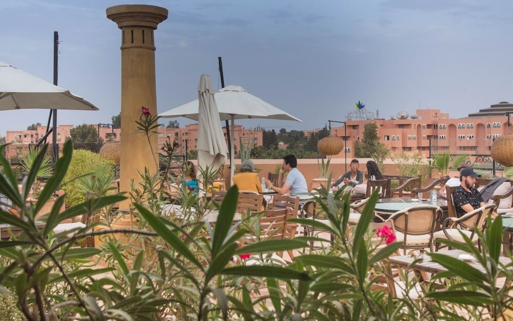 Фото Amani Hotel Suites & SPA