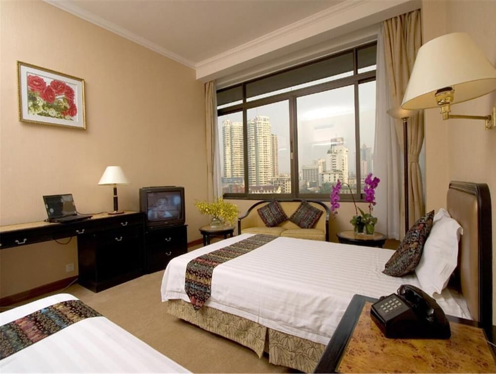 Фото Guangzhou Aiqun Hotel