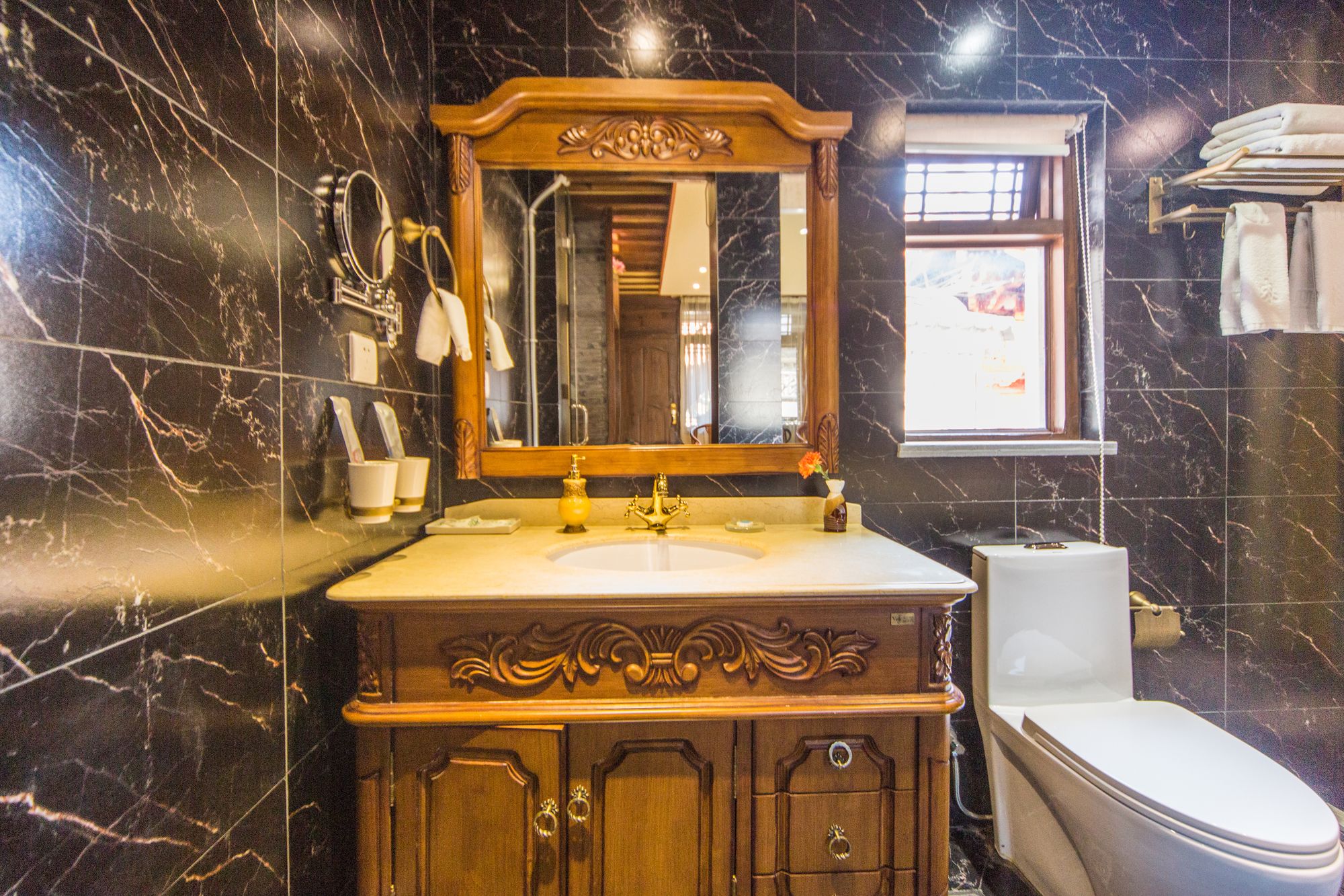 Фото Li Jiang Hemuju Inn