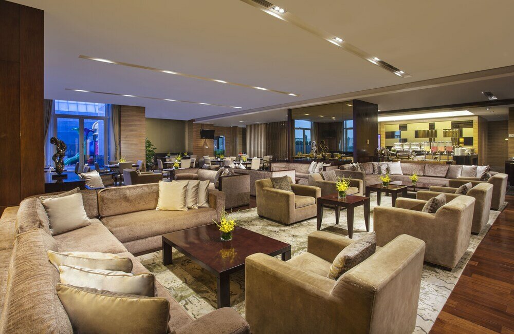 Фото Somerset Grand Central Dalian