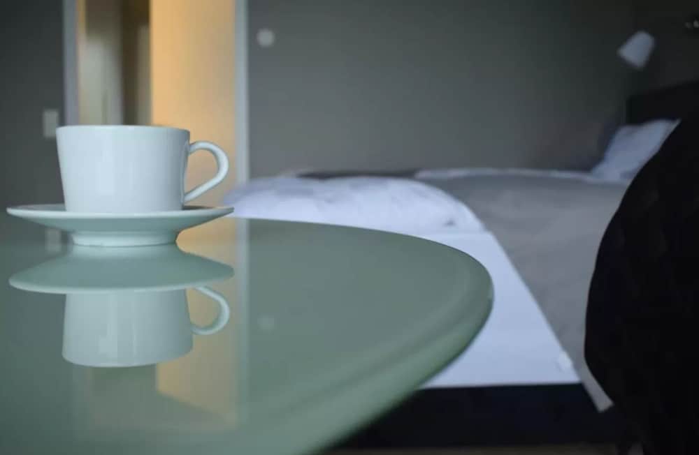 Фото Black Beach Suites