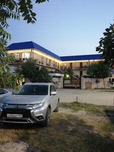 У моря