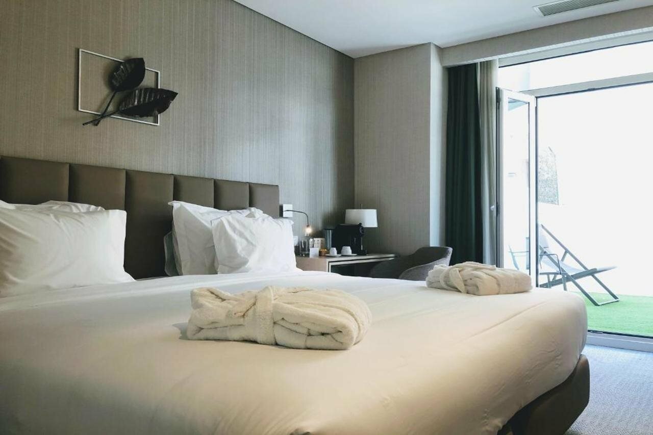 Фото The Leaf Boutique Hotel