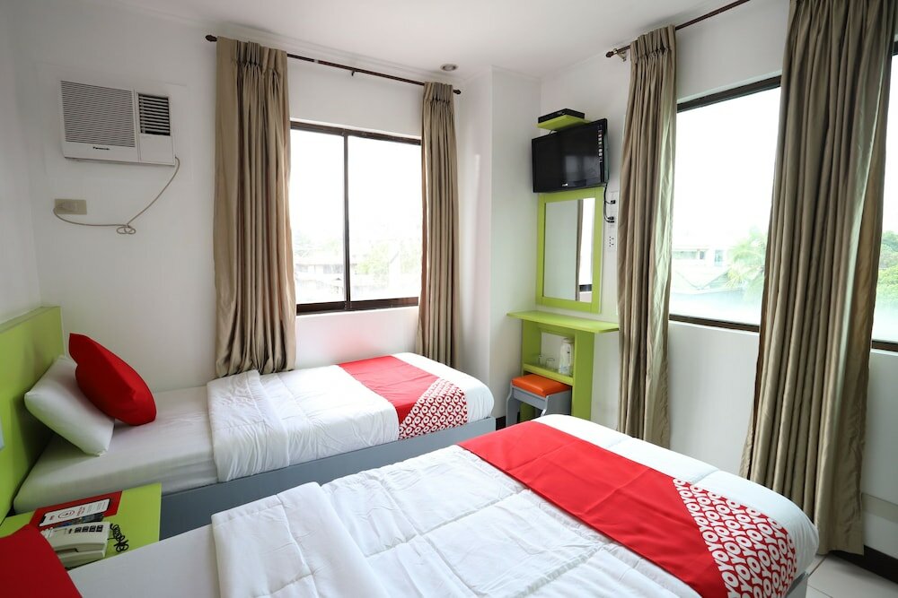 Фото Oyo 210 Apple Tree Suites