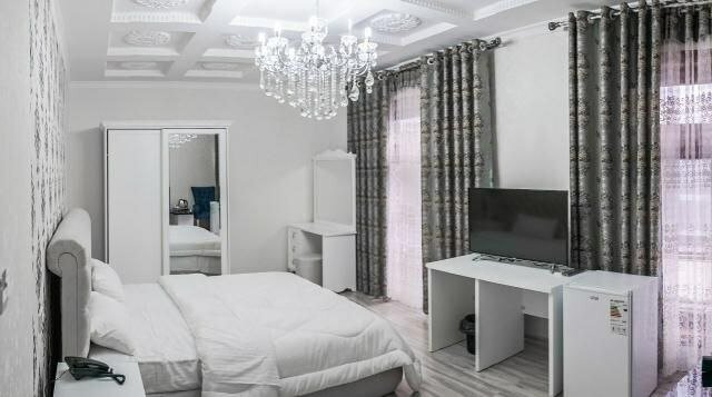 Фото Гранд Нодирбек