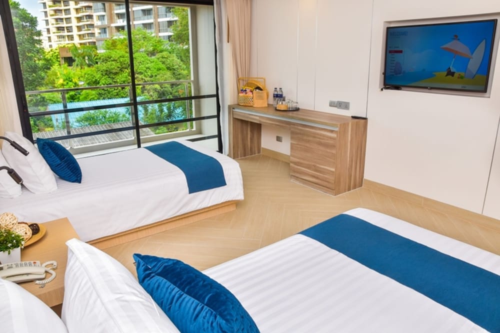 Фото Golden Tulip Pattaya Beach Resort