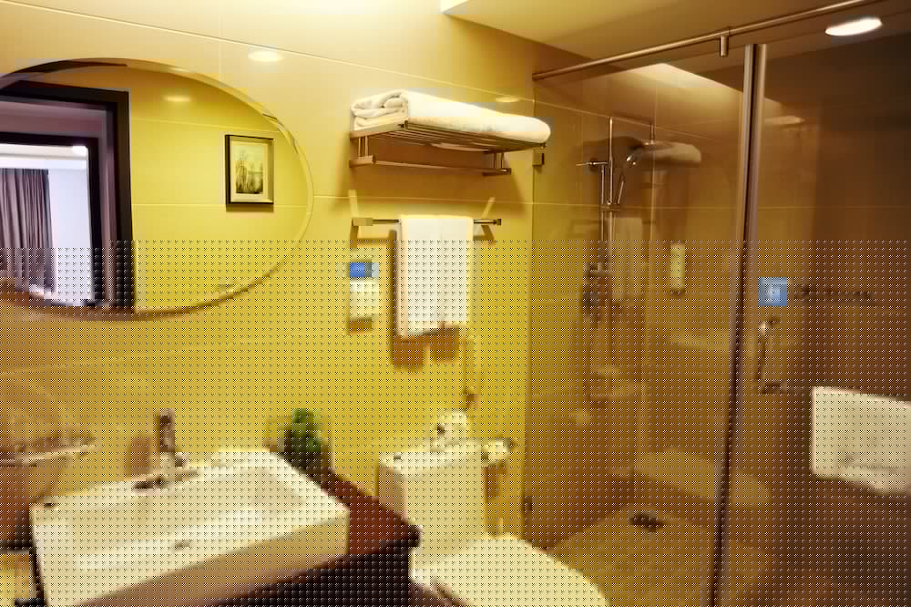 Фото Qingdao Housing International Hotel