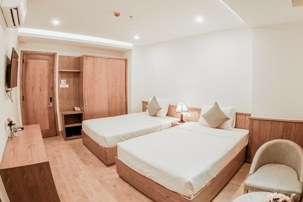 Фото Quang Vinh Hotel