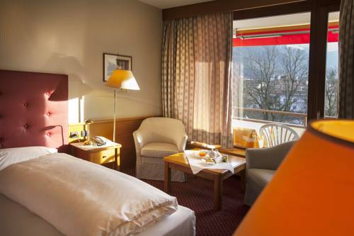 Фото Alpine City Wellness Hotel Dominik