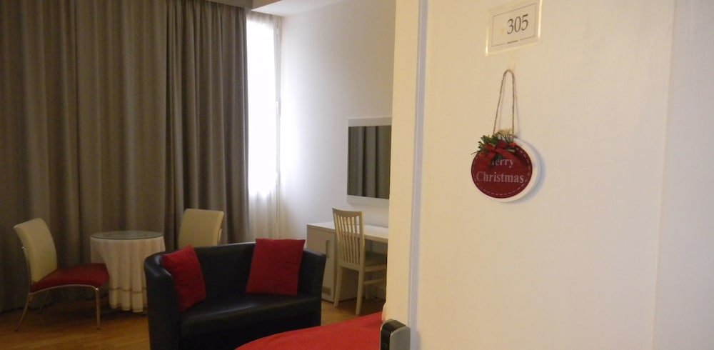 Фото Suites Farnese Design Hotel