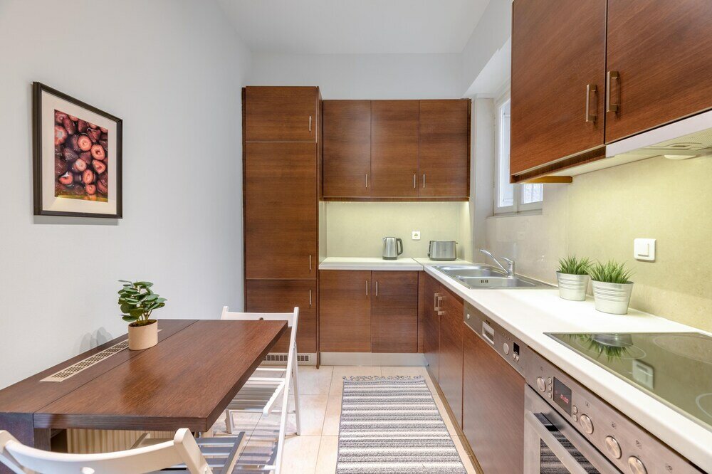 Фото Panoramic 1br Apt near Kallimarmaro