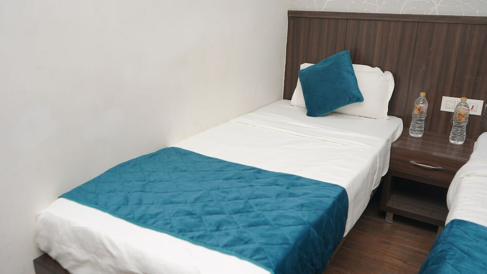 Фото Qotel Hotel Rajori Garden