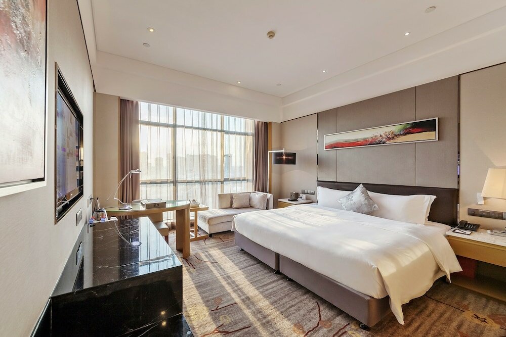 Фото Tianyuan Junlong Hotel