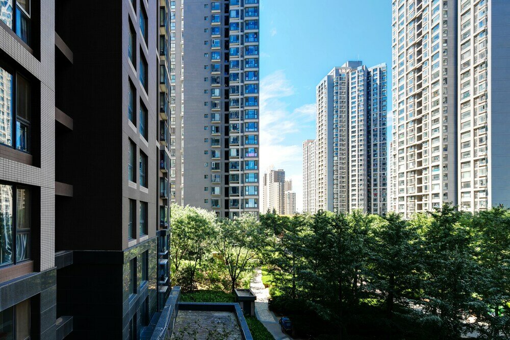 Фото Xiwangju Apart-hotel