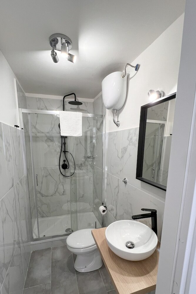 Фото Cozy Rooms Napoli