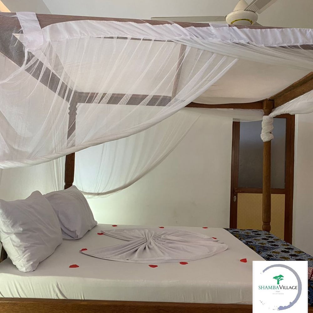 Фото Shamba Village Hotel