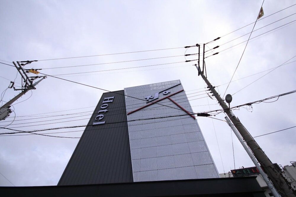 Фото Yeosu Hakdong Ja Self Check-in Motel