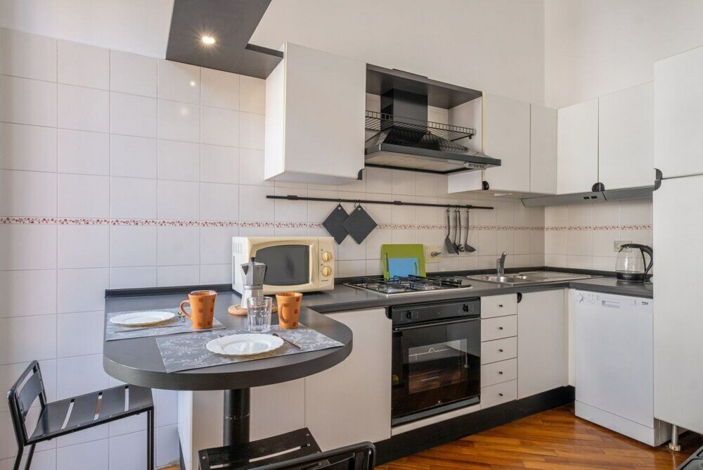 Фото A due passi dalla Pinacoteca Apartment