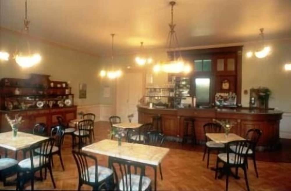 Фото Brit Hotel Grand Hotel Munster