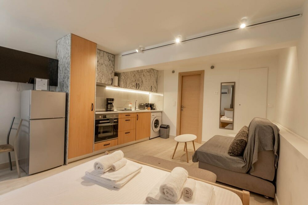 Фото Athens Plaka Family Suites