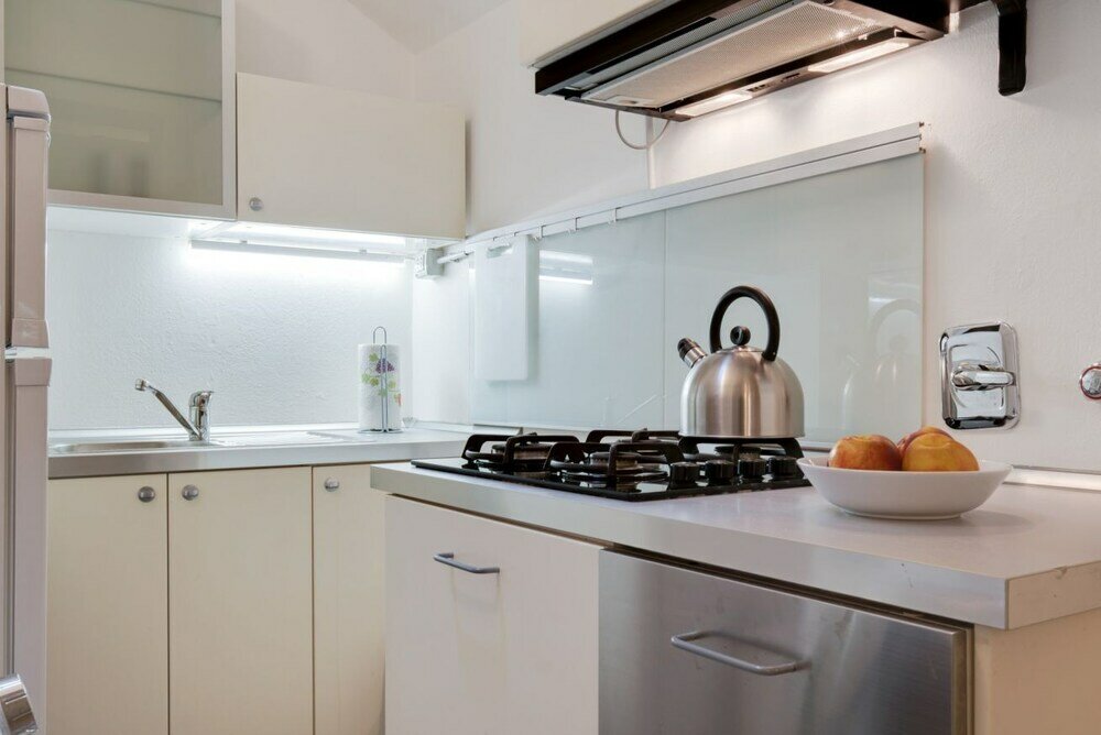 Фото VIA Santo Stefano Secret Garden Apartment